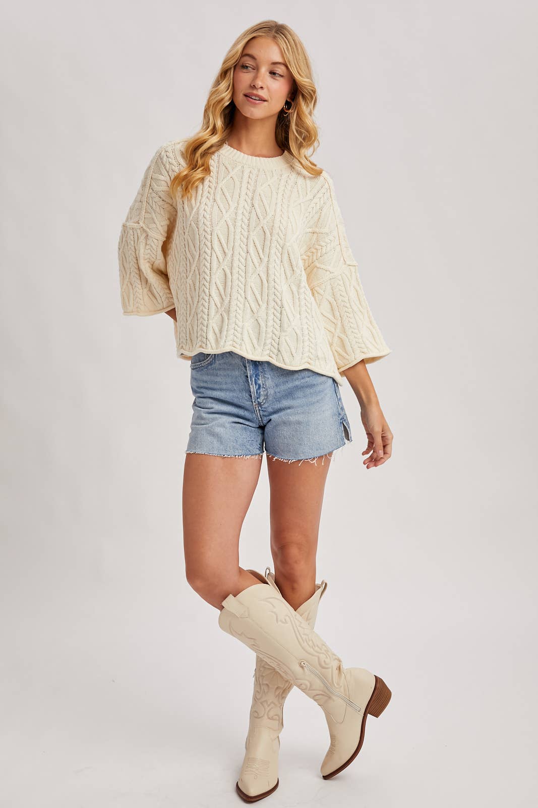 OVERSIZED BELL SLEEVE CABLE KNIT SWEATER